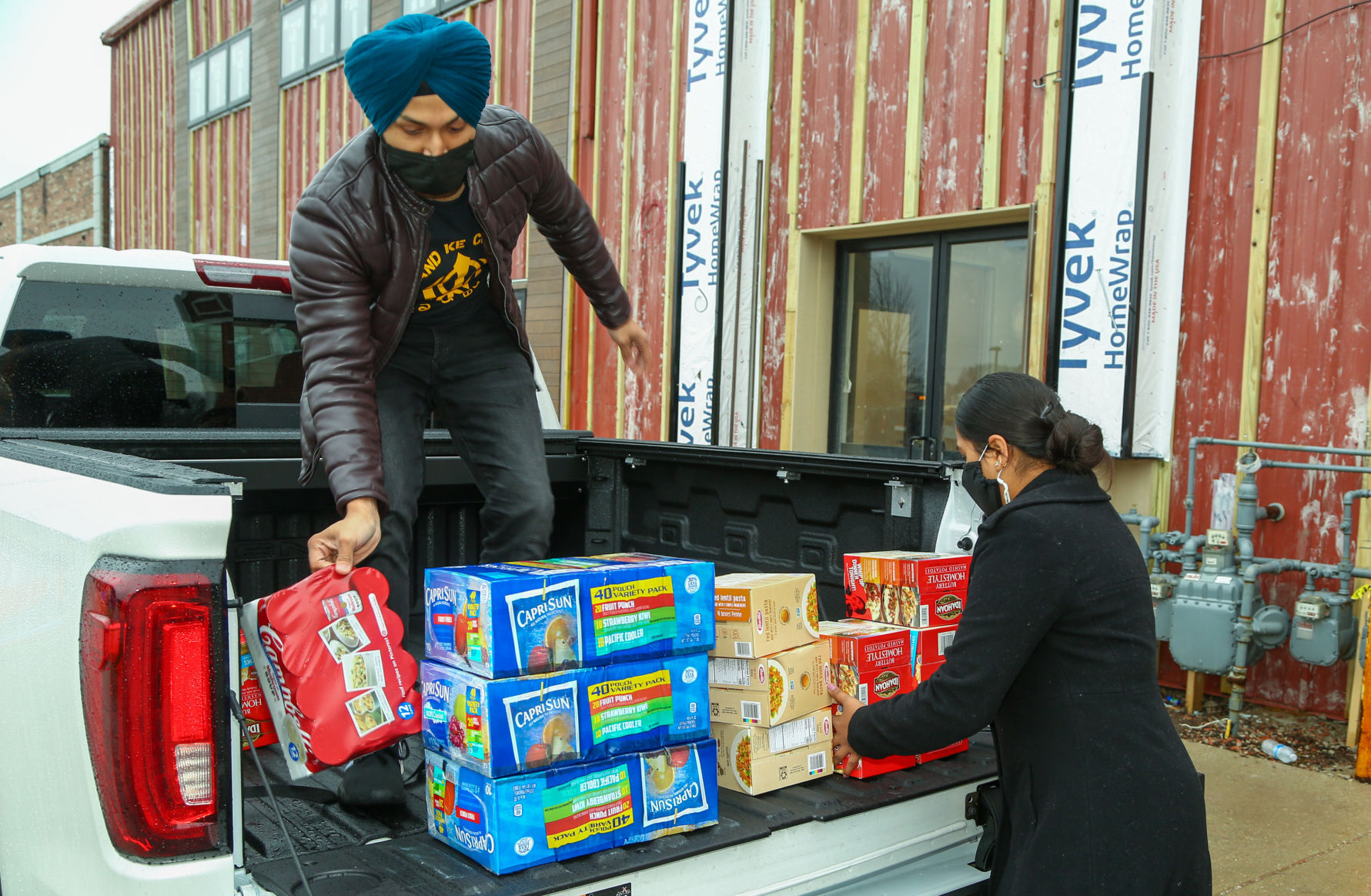 The Sikh Religious Society of Indiana distribute food donations